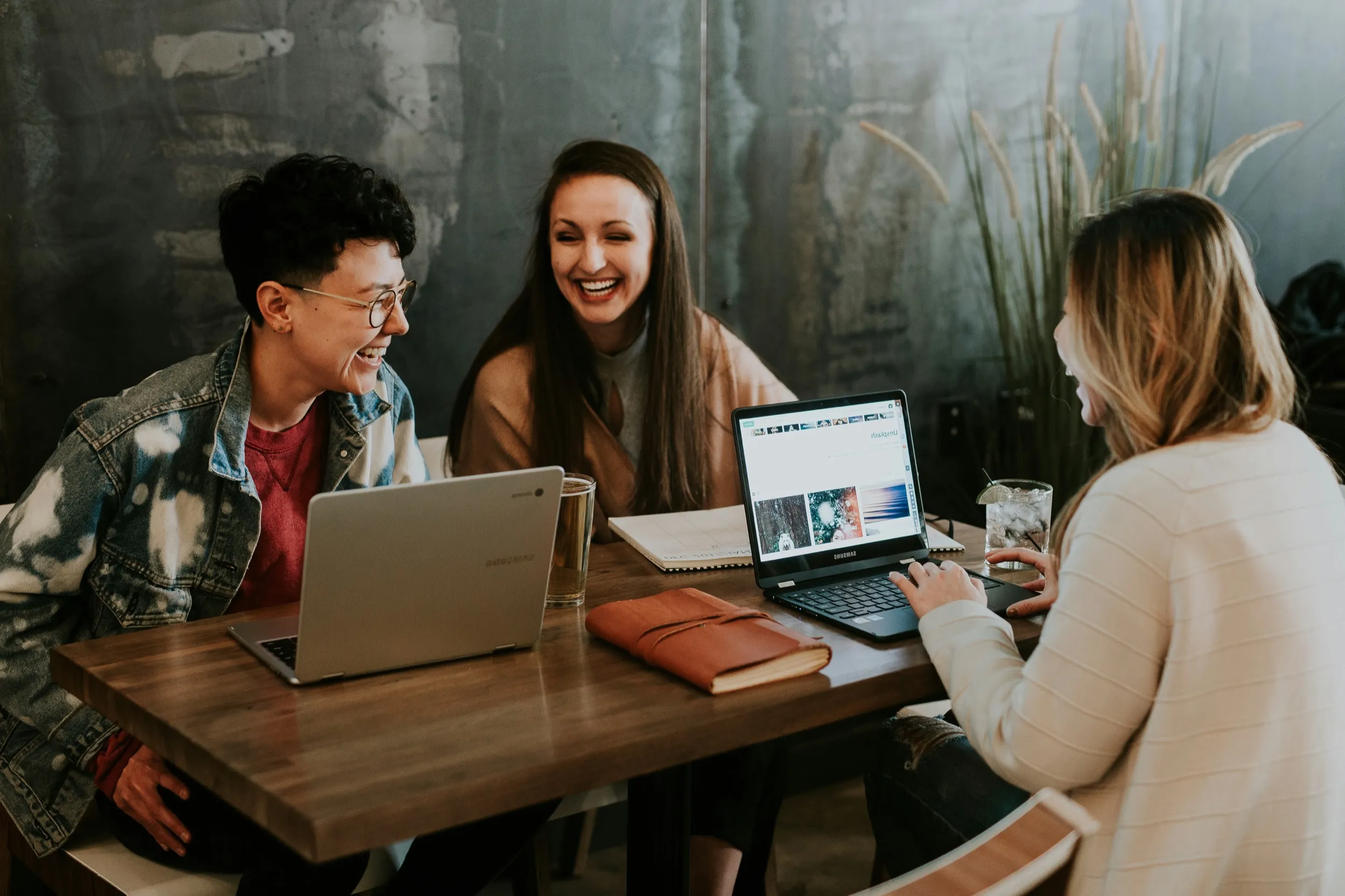 Service-based professionals collaborating around a table
